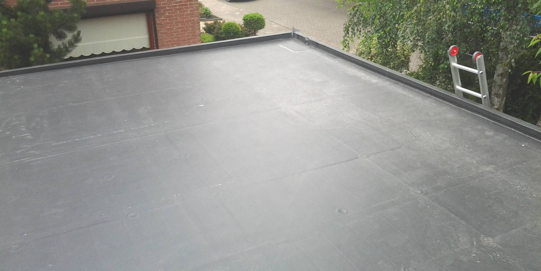 dakbedekking plat dak renoveren